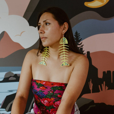 Model wearing Neon Pear Large Salmon Ghost Earrings