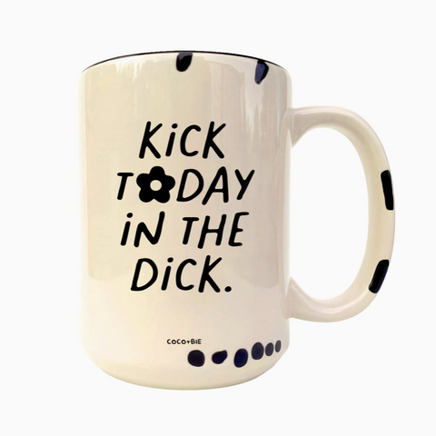 Mug with text 'Kick today in the dick' and a flower symbol on a white background