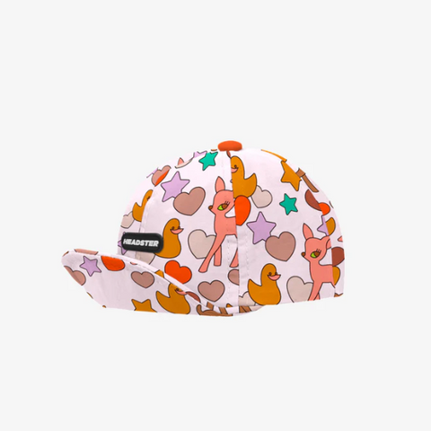 Colorful cap with cartoon designs on a white background