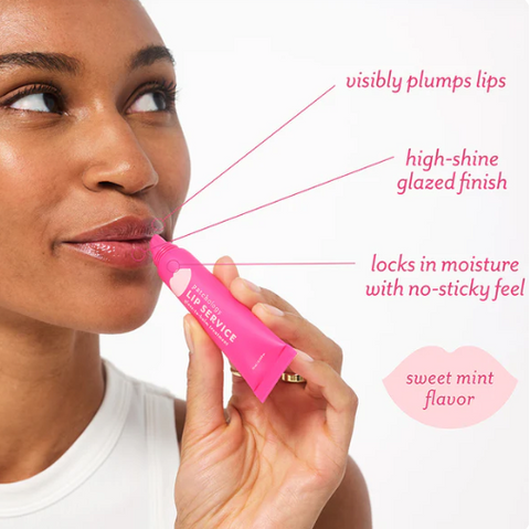 Woman applying pink lip balm with text highlighting features on a white background