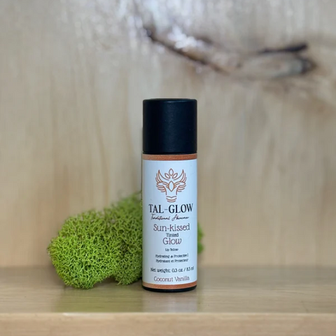 Tal-Glow product on a wooden shelf with a natural background