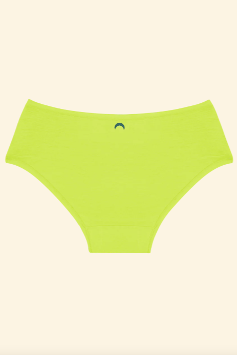 Green underwear on a beige background