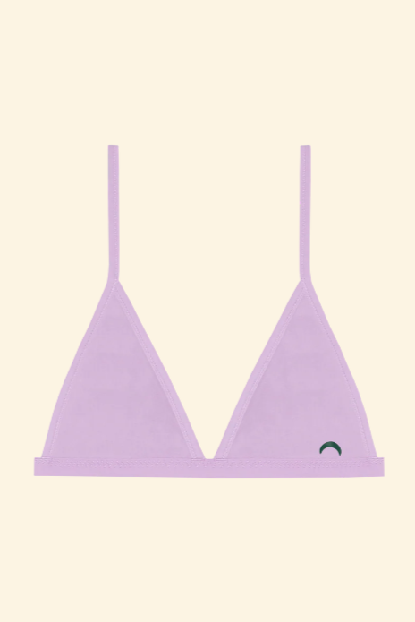 Lavender triangle bikini top on a beige background