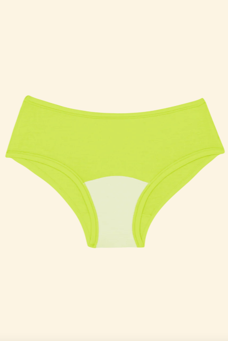 Green underwear on a beige background