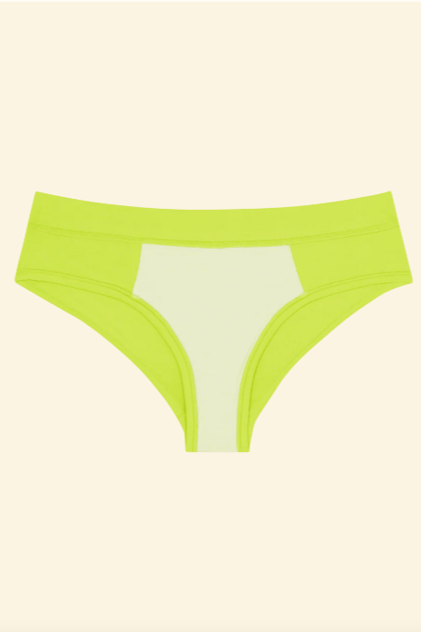 Green underwear on a beige background