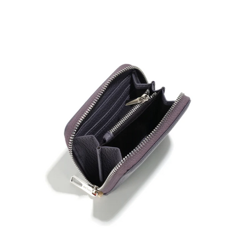 Purple wallet with open compartment on a white background