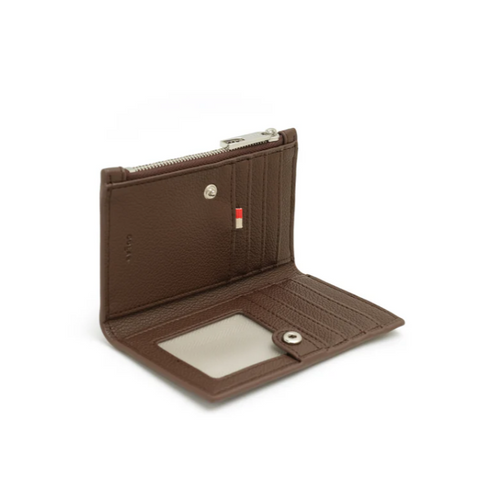 Brown wallet with visible vegan label on a white background