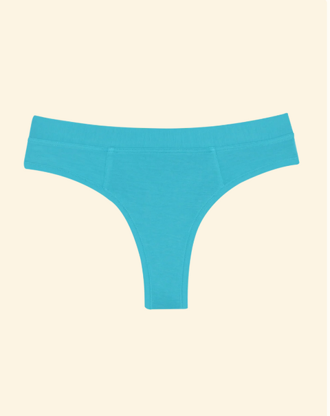 Blue thong on a beige background