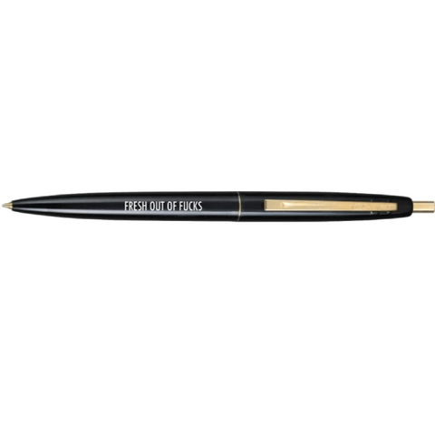 Black pen with gold accents on a white background