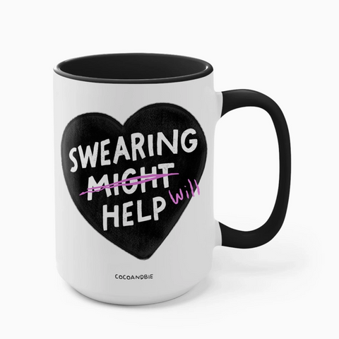 Mug with a black heart design and text on a white background
