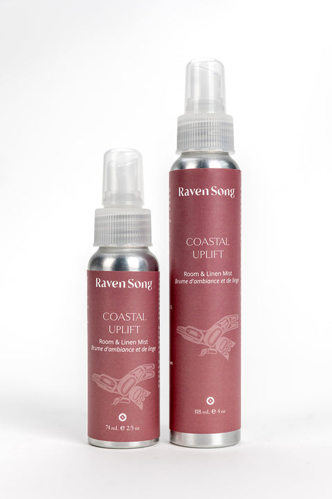 Two bottles of Raven Song Coastal Uplift room and linen mist on a white background