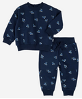 A two-piece kids' outfit set consisting of a navy blue sweatshirt and matching jogger pants, both featuring a repeating pattern of ice skates in shades of blue, white, and light gray.