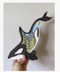 3d layered wooden orca art with trees and sky