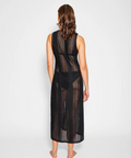 Woman wearing a black lace dress on a white background