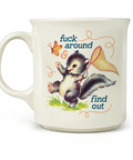 An off-white ceramic mug featuring a retro-style illustration of a skater squirrel holding a butterfly net, with the text 'fuck around & find out' and a butterfly.