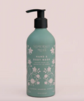 Somerset Moss hand and body wash bottle on a light pink background