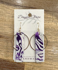 Purple and white marbled hoop earrings on a branded card with 'Dayna Olson' branding.