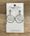 Earrings on a Dayna Olson branded card with 'Vancouver Island Handmade' text on a wooden surface.