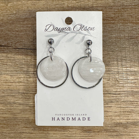 Earrings on a Dayna Olson branded card with 'Vancouver Island Handmade' text on a wooden surface.
