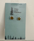 Pair of earrings on a 'Tide and Timber' branded card with a tree design.