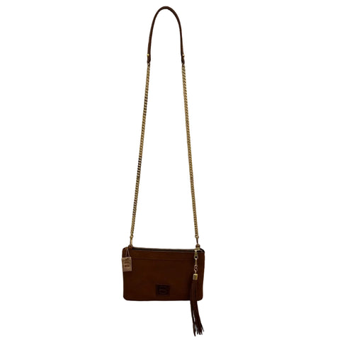 Brown leather bag with a chain on a white wooden surface