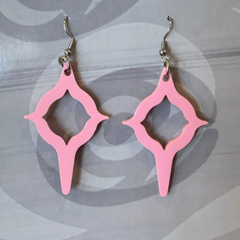 Coast Salish Art Earrings on a card with branding details