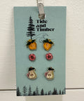 Set of earrings on a Tide and Timber branded card with a white background