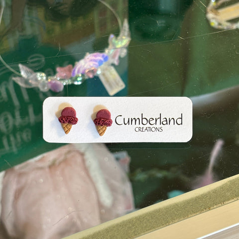 Product with 'Cumberland' branding on a reflective surface