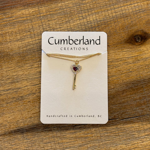 Jewelry card with a necklace on a wooden surface