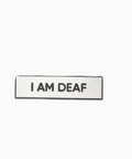 Badge with 'I AM DEAF' text on a white background