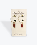 Pair of earrings on a Danya Olson branded card with 'Vancouver Island Handmade' text.