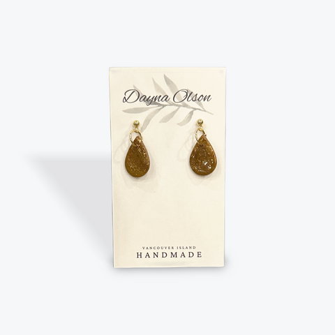 Pair of gold teardrop earrings on a 'Dayna Olson' branded card with 'Vancouver Island Handmade' text.
