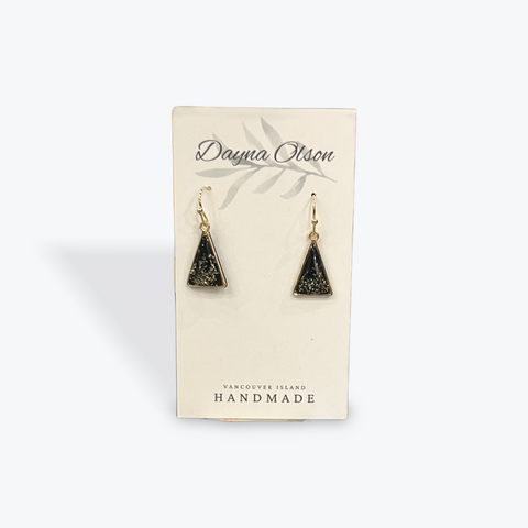 Pair of triangle-shaped earrings on a 'Dayna Otson' branded card.