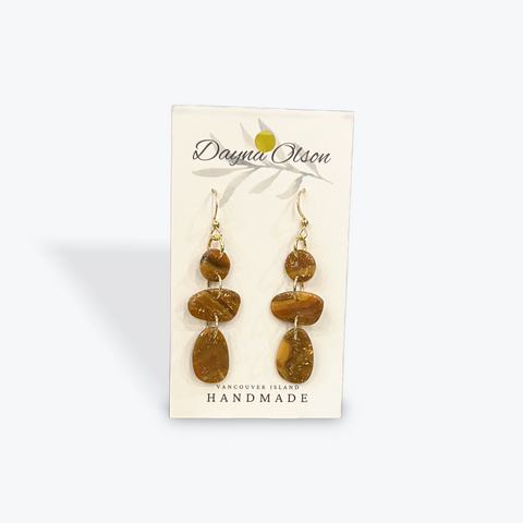 Pair of brown stone earrings on a 'Dayna Olson' card with 'Vancouver Island Handmade' text.