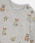 Close-up of the woodland animal print and shoulder buttons on the Deux par Deux baby set.