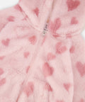 Close-up of the pink heart-patterned faux fur and zipper on the Deux par Deux jacket.