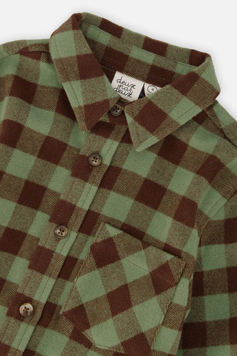 Close-up of the green and brown plaid, collar and buttons on the Deux par Deux brushed flannel shirt.