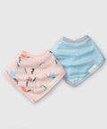 Two baby bibs, one with a pink and orange pattern and the other with a blue pattern, on a light gray background.