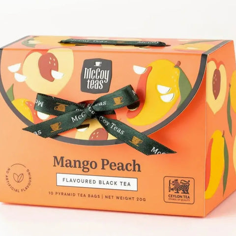 Mango Peach tea box with Nigella Teas branding on a white background
