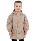 Child wearing a beige patterned raincoat on a white background