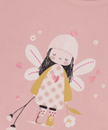 A close-up of a pink long-sleeve children's top featuring a cute fairy graphic on the front. The graphic depicts a girl fairy with black hair, a pink and white checkered dress, a yellow cape, and pink wings, surrounded by small white flowers and pink hearts.