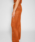 Brown crochet top and pants set on a white background