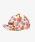 Colorful cap with cartoon designs on a white background