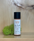 Tal-Glow product on a wooden shelf with a natural background