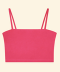 Pink crop top with thin straps on a beige background