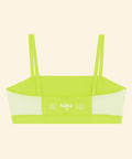 Neon green bikini top with thin straps on a beige background