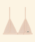 Light pink bra on a beige background