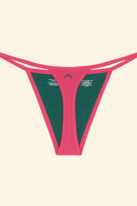 Pink thong on a beige background