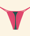 Pink thong with green center on a beige background
