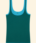 Green tank top with blue trim on a beige background